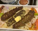 A picture of step 8 of Chullu kabab with butter saffron rice.