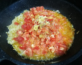 Foto del paso 7 de la receta: Pimientos rellenos con bacalao y arroz sobre salsa de tomate