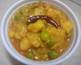 A picture of step 4 of Aloo Matar Ki Sabji without onion garlic.