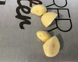 Une image de l'étape 8 de Poulet aux cacahuètes, carottes, tomates et épices.