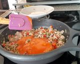 A picture of step 8 of Cuban-Style Picadillo.
