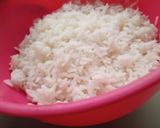 A picture of step 2 of Coloured chicken stir fried rice.