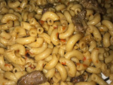 Brown macaroni with beef meat