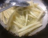 A picture of step 2 of Chilli potato fries.