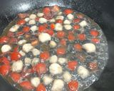 A picture of step 2 of Spaghetti with scallops and squid ink.