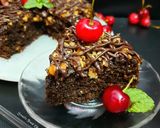 A picture of step 7 of Oatmeal Walnut & Chocolate Brownie Cake Eggless.