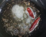 A picture of step 2 of Moong dal dalia broken weat.