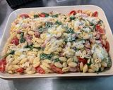 Une image de l'étape 14 de Gratin de gnochettis aux épinards, lard et tomates.
