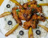 A picture of step 4 of Buffalo hot wings with fried spring onions rice.