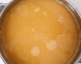 A picture of step 2 of Orange Strawberry Smoothie.