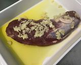 A picture of step 5 of Oven-Roasted Pork Tenderloin with Pink Garlic, Red Onion, and Rosemary.