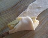 Foto del paso 4 de la receta: Tequeños de queso y aceitunas👩🏼‍🍳