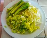 A picture of step 1 of Stir fried Cabbage, green peas, bok choy stuffed Pita bread.