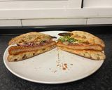 A picture of step 5 of Crispy Chicken Sandwich with Pickled Red Onion and Sriracha Mayo.