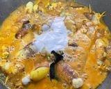 Gambar langkah 7 resipi Sotong Sumbat Masak Lemak Kuning.