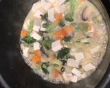 A picture of step 2 of Canh Kiểm (Vietnamese Coconut Vegetable Soup).