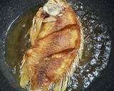 รูปขั้นตอนการทำที่ 4 ของ ปลา​ทับทิม​ทอด​กระเทียม​🐟