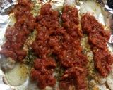 Foto del paso 6 de la receta: Filet de merluza a la pizza