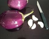 A picture of step 1 of Baigan Brinjal Bhartha.