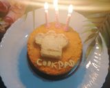 A picture of step 8 of Carrot cookpad logo cake.