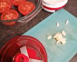 Une image de l'étape 2 de Tomates gratinées à l'ail et persil.