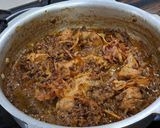 A picture of step 9 of Bhopali Red Rice Chicken Biryani.