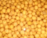 A picture of step 1 of Indian snack (crisp sphere with flavoured water/curd mixture).