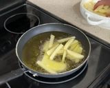 A picture of step 2 of SPANISH TAPA 4 INGREDIENTS - Huevos Rotos con Jamón | Potatoes with Eggs and Spanish Ham.