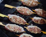 A picture of step 6 of Kefta Skewers on a Bed of Steamed Rice with Green Peas.
