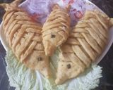 A picture of step 7 of Stuffed pleated fish.