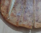 A picture of step 9 of Dominos style stuffed garlic bread.