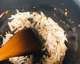 A picture of step 3 of Mutter Alo pulao.