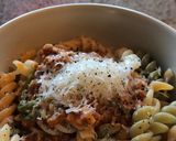 A picture of step 6 of Pasta w butternut squash sauce, sausage and spinach.