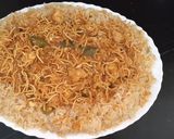 A picture of step 3 of American chop suey with fried rice.
