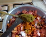 A picture of step 8 of Carrots and Tomato Bujeya.
