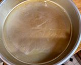 A picture of step 4 of Choco Biko with white coconut shreds and toasted coconut.
