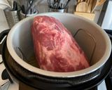 A picture of step 1 of Instant Pot Frozen Pork Roast.