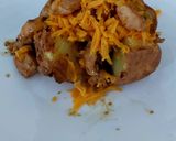 A picture of step 6 of Jacket Potato filled with Chicken in Peppercorn Sauce. 🤩.