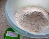 A picture of step 2 of Mandazi-ginger.