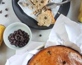 A picture of step 5 of Eggless Banana Cake with chocolate chips.