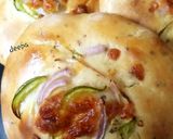 A picture of step 8 of Paneer stuffed foccasia bun.