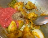 A picture of step 5 of Nadia Bara Tarkari (Coconut dumplings curry).