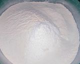 A picture of step 1 of Eggless pizza dough.