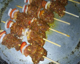 A picture of step 6 of Tsire Skewers.