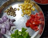 A picture of step 1 of Maggi Pizza.