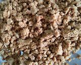 A picture of step 2 of Gud papadi laddoo.