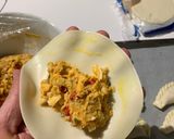 A picture of step 4 of Corn and Cheese Baked Empanadas.