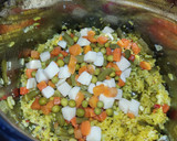 Foto del paso 7 de la receta: Arroz con pollo y macedonia de verduras