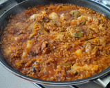 Foto del paso 6 de la receta: Paella de bacalao y alcachofas