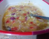 A picture of step 2 of Masala Egg omelette.